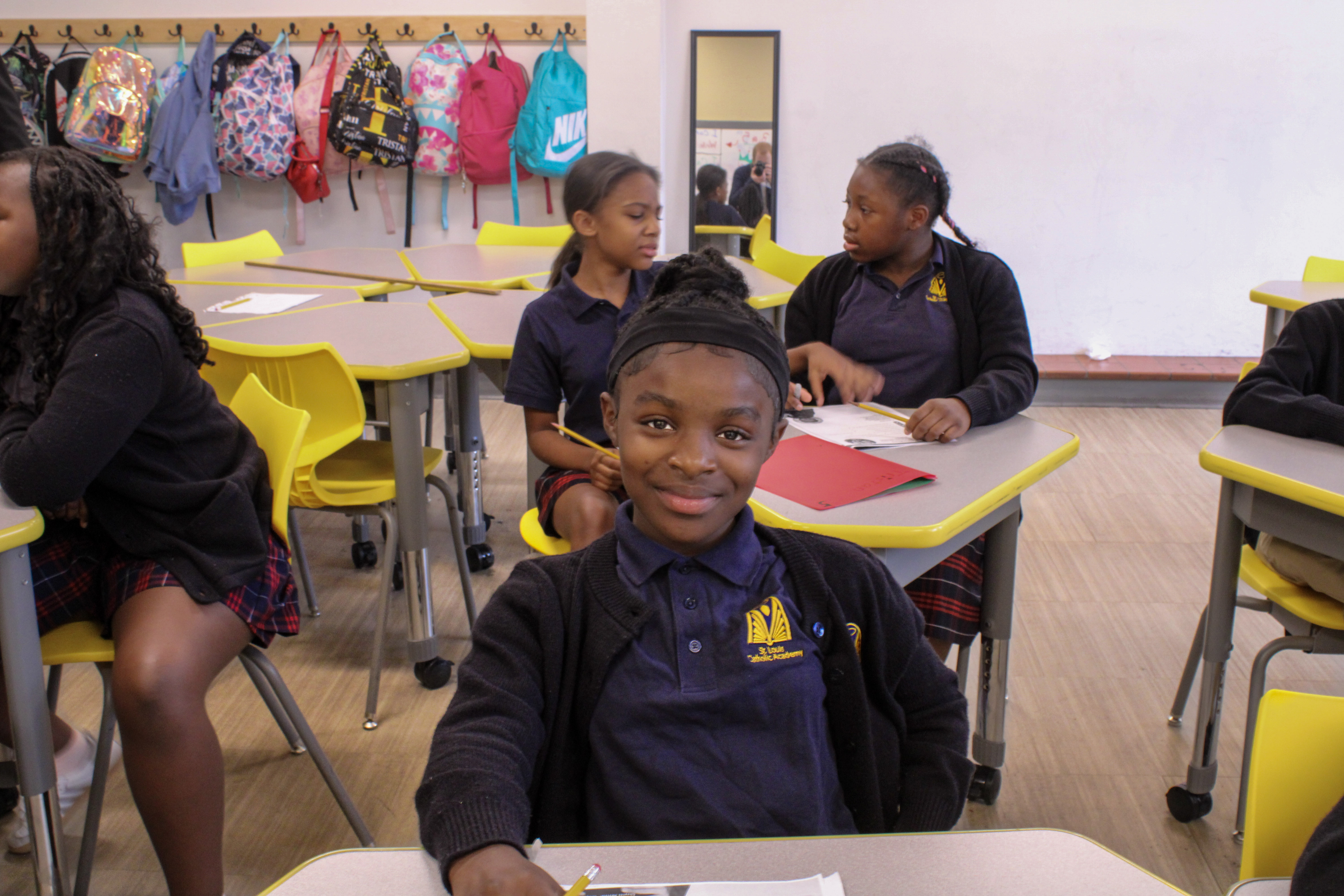 Smiling student at desk
