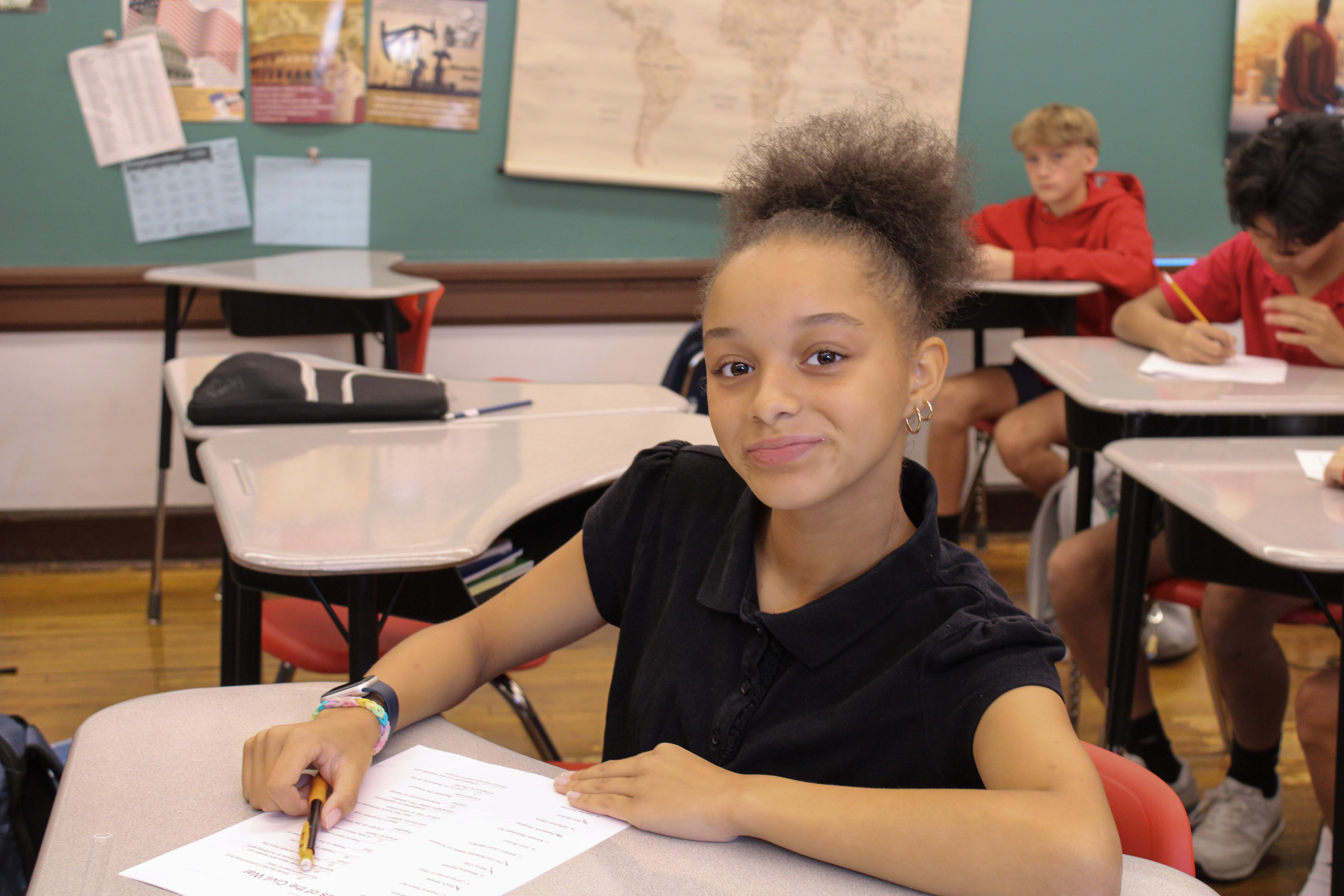 Young student smiling at camera