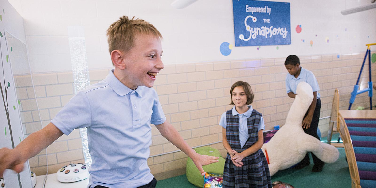 Students playing in the new sensory room at Annunziata Catholic School