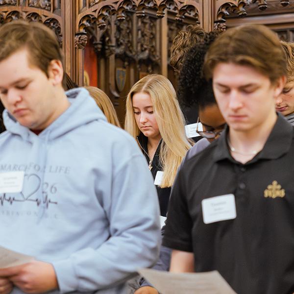 Students reflect and pray at the start of the day