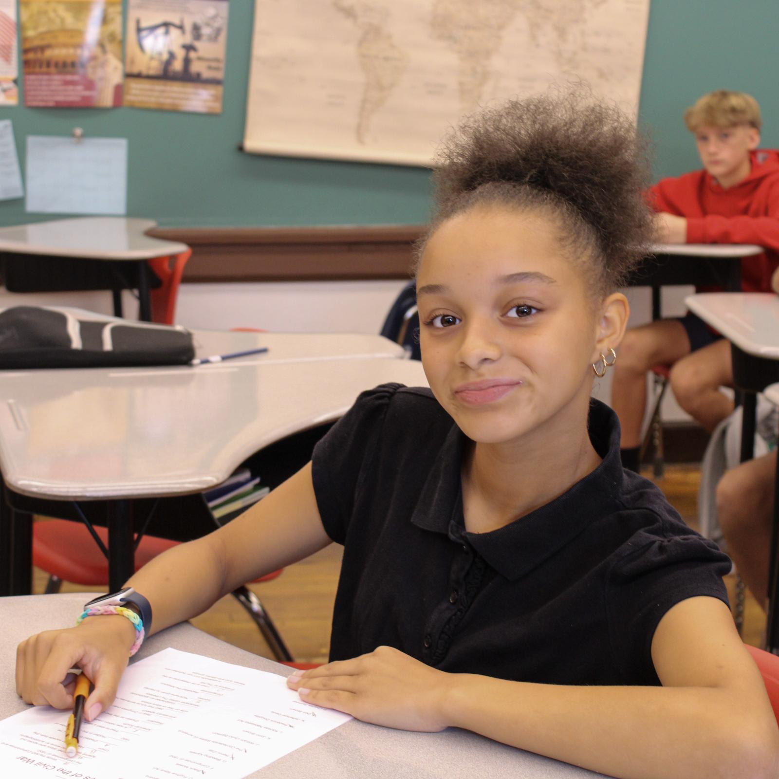 Young student smiling at camera